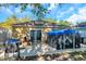 Backyard view highlighting the patio area and storage shed at 8528 Quarter Horse Dr, Riverview, FL 33578