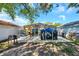 Spacious backyard featuring a storage shed and concrete patio, perfect for outdoor gatherings at 8528 Quarter Horse Dr, Riverview, FL 33578