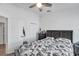 Cozy bedroom featuring a ceiling fan, closet, and dresser at 8528 Quarter Horse Dr, Riverview, FL 33578