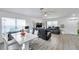 Open living space with seamless flow between the dining area, kitchen, and living room at 8528 Quarter Horse Dr, Riverview, FL 33578