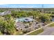 Aerial view of community pool with seating and parking area at 8528 Quarter Horse Dr, Riverview, FL 33578