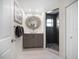 Modern bathroom with walk-in shower and sleek vanity at 8685 E Bay Dr, Treasure Island, FL 33706