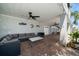 Covered patio with outdoor seating area at 8685 E Bay Dr, Treasure Island, FL 33706