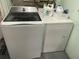 White GE Profile washer and dryer set, offering convenience for laundry tasks at 8829 93Rd St, Seminole, FL 33777