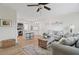 Cozy living space integrates seamlessly with a modern kitchen, accented by stylish furnishings and plenty of natural light at 8829 93Rd St, Seminole, FL 33777