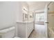 Bathroom with white vanity and tile floors at 9118 Lake Chase Island Way # 9118, Tampa, FL 33626