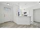 Bright and airy kitchen with white cabinets, modern appliances, and an open layout, perfect for cooking and socializing at 9118 Lake Chase Island Way # 9118, Tampa, FL 33626