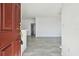 Bright, freshly painted, modern living room showcasing new flooring and an open floor plan, perfect for entertaining at 9118 Lake Chase Island Way # 9118, Tampa, FL 33626