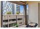 City view from the balcony with black metal railings and the patio chair offering a private outdoor space at 100 4Th S Ave # 220, St Petersburg, FL 33701