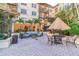 Courtyard featuring cushioned seating, mature landscaping, and shade creating an inviting outdoor space at 100 4Th S Ave # 220, St Petersburg, FL 33701