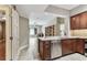 Well-equipped kitchen with stainless steel dishwasher, granite countertops, and opens to the living area at 100 4Th S Ave # 220, St Petersburg, FL 33701
