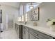 Luxurious bathroom featuring double sinks, ample counter space, and stylish fixtures at 103 Morgan Dr, Belleair Beach, FL 33786