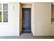 Welcoming front door with a cute doormat on a brick entry at 1030 Tidewater Shores Loop # 104, Bradenton, FL 34208