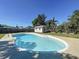 Backyard features a private swimming pool surrounded by lush greenery, enhancing outdoor leisure at 10754 63Rd Ave, Seminole, FL 33772