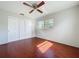 Bright bedroom with hardwood floors, ceiling fan and window with natural light at 10754 63Rd Ave, Seminole, FL 33772