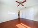 Bedroom with hardwood floors and closet at 10754 63Rd Ave, Seminole, FL 33772