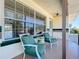 Welcoming front porch with comfortable seating, offering a relaxing outdoor space at 10754 63Rd Ave, Seminole, FL 33772