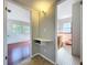 Hallway featuring access to both a bedroom and bathroom at 10754 63Rd Ave, Seminole, FL 33772