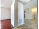 Hallway features multiple rooms, tile flooring, and natural light at 10754 63Rd Ave, Seminole, FL 33772