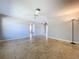 Large living room with travertine tile and ceiling fan perfect for relaxing and entertaining guests at 10754 63Rd Ave, Seminole, FL 33772