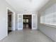 Sunroom with views to the backyard and entry to living room at 10754 63Rd Ave, Seminole, FL 33772