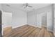 Bedroom featuring a ceiling fan, closet, and luxury vinyl plank flooring at 11503 Quiet Forest Dr, Tampa, FL 33635