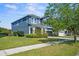 Charming two-story home featuring manicured lawn and a convenient two-car garage at 11503 Quiet Forest Dr, Tampa, FL 33635