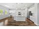 Modern kitchen with island, stainless steel appliances, and white cabinets at 11503 Quiet Forest Dr, Tampa, FL 33635