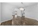 Bright living room showing wood floors and architectural features at 11503 Quiet Forest Dr, Tampa, FL 33635