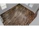 Hardwood flooring in spacious loft, windows line walls at 11503 Quiet Forest Dr, Tampa, FL 33635