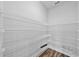 Walk-in pantry with wood floor and wire shelving at 11503 Quiet Forest Dr, Tampa, FL 33635