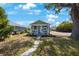 Quaint single-story home with a welcoming front porch and a partially shaded lawn at 1160 36Th N Ave, St Petersburg, FL 33704