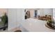 Open kitchen with stainless steel appliances and quartz countertops offers a modern aesthetic at 1160 36Th N Ave, St Petersburg, FL 33704