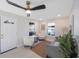 Bright living room with modern furnishings, large windows, and light wood flooring, creating a welcoming atmosphere at 1160 36Th N Ave, St Petersburg, FL 33704