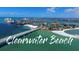 Scenic aerial view of Clearwater Beach, showcasing the coastline and cityscape at 1226 S Missouri Ave # 1013, Clearwater, FL 33756