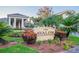 Beautiful entrance to The Avalon with a water fountain and lush landscaping at 1226 S Missouri Ave # 1013, Clearwater, FL 33756