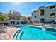 Community pool featuring poolside cabanas and a pristine pool at 1226 S Missouri Ave # 1013, Clearwater, FL 33756