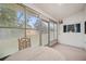 Sunroom with large glass windows and plenty of natural light at 13102 Wagner Dr, Hudson, FL 34667
