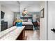 Relaxing primary bedroom featuring a dresser, beach decor, and comfortable king bed at 1804 Bunker Hill Dr, Sun City Center, FL 33573