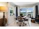 Breakfast nook with seating, nice natural lighting and tranquil water views at 1804 Bunker Hill Dr, Sun City Center, FL 33573