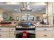 Well-lit kitchen showcasing granite countertops, modern stainless steel appliances, and a functional design at 1804 Bunker Hill Dr, Sun City Center, FL 33573