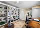 Spacious living room with a large built-in bookcase and beautiful decor at 1804 Bunker Hill Dr, Sun City Center, FL 33573