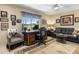 A comfortable living room with a view of the water and decorated with nautical elements at 1804 Bunker Hill Dr, Sun City Center, FL 33573