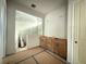 Unfinished bathroom featuring a tiled floor, double sink vanity and an open shower space at 2301 Burlington Ave, St Petersburg, FL 33713