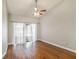 Hardwood floors, vaulted ceiling, and ample natural light make this bedroom feel luxurious and bright at 2412 Arborwood Dr, Valrico, FL 33596