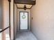 Close-up of the front door with a wreath, showing the entryway and exterior wall at 2412 Arborwood Dr, Valrico, FL 33596