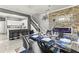 Elegant dining room with stylish decor, modern lighting, and an adjacent open kitchen area at 2759 Conch Hollow Dr, Brandon, FL 33511