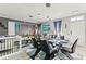 Spacious dining room featuring modern chandelier and access to a living area at 2759 Conch Hollow Dr, Brandon, FL 33511