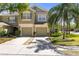 Inviting two-story home with a two-car garage and a beautifully landscaped front yard at 2759 Conch Hollow Dr, Brandon, FL 33511