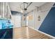 Spacious garage with ample storage space and a stylish blue accent wall at 2759 Conch Hollow Dr, Brandon, FL 33511